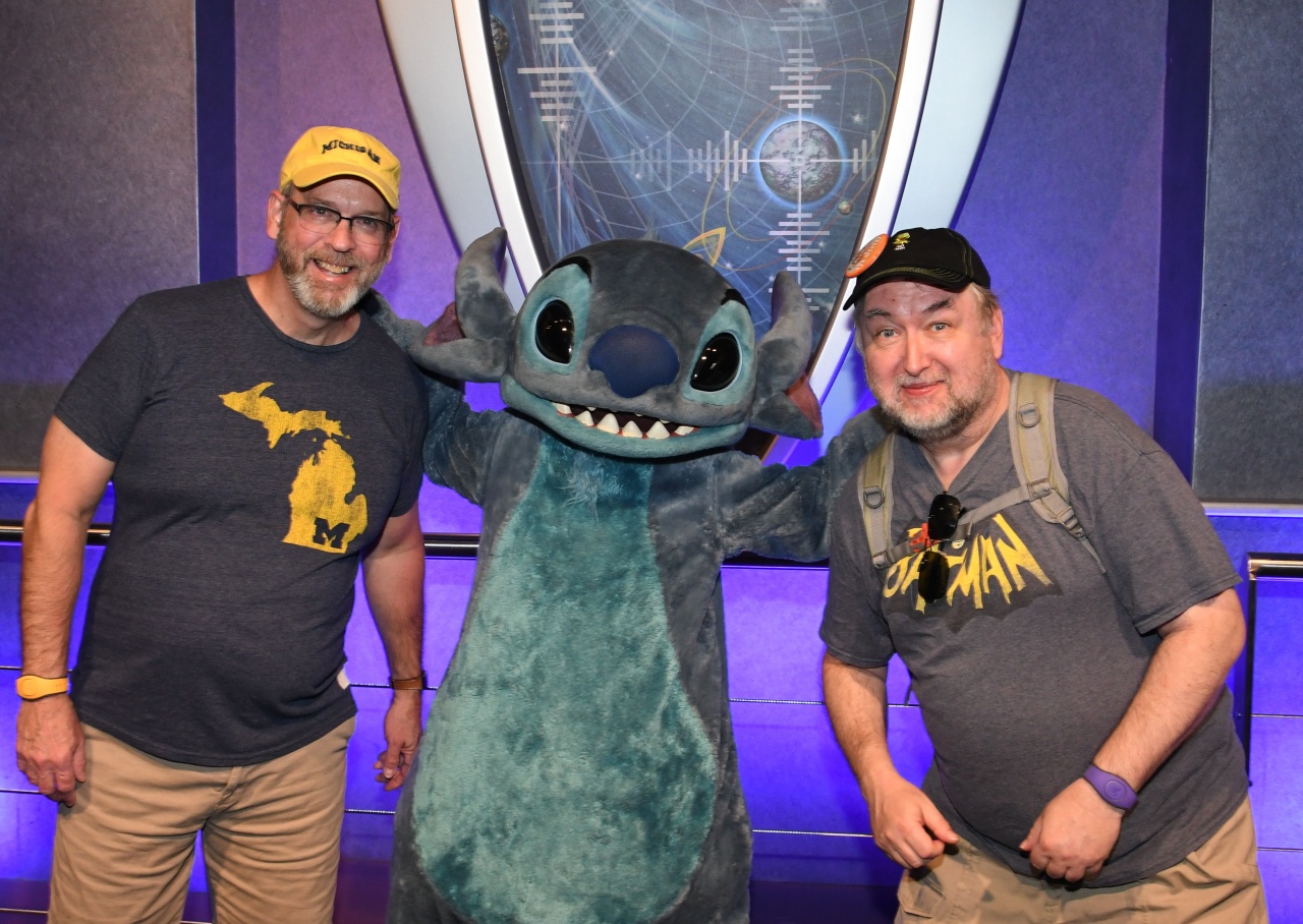 Having fun posing with Stitch in Tomorrowland.