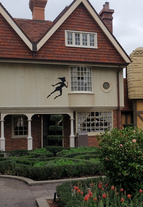 Peter Pan on the wall of a United Kingdom pavilion building.