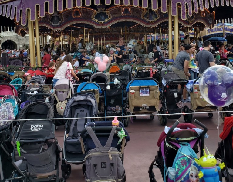 Stollers in front of King Arthur's Carousel.