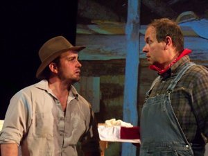 Curly and Lenny in "Of Mice and Men"